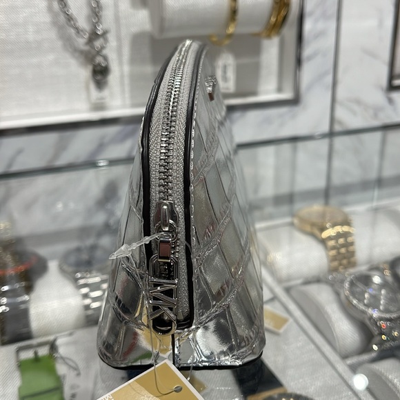 Michael Kors Empire Sm Metallic Crocodile Embossed Leather Travel Pouch
Silver - Picture 3 of 16